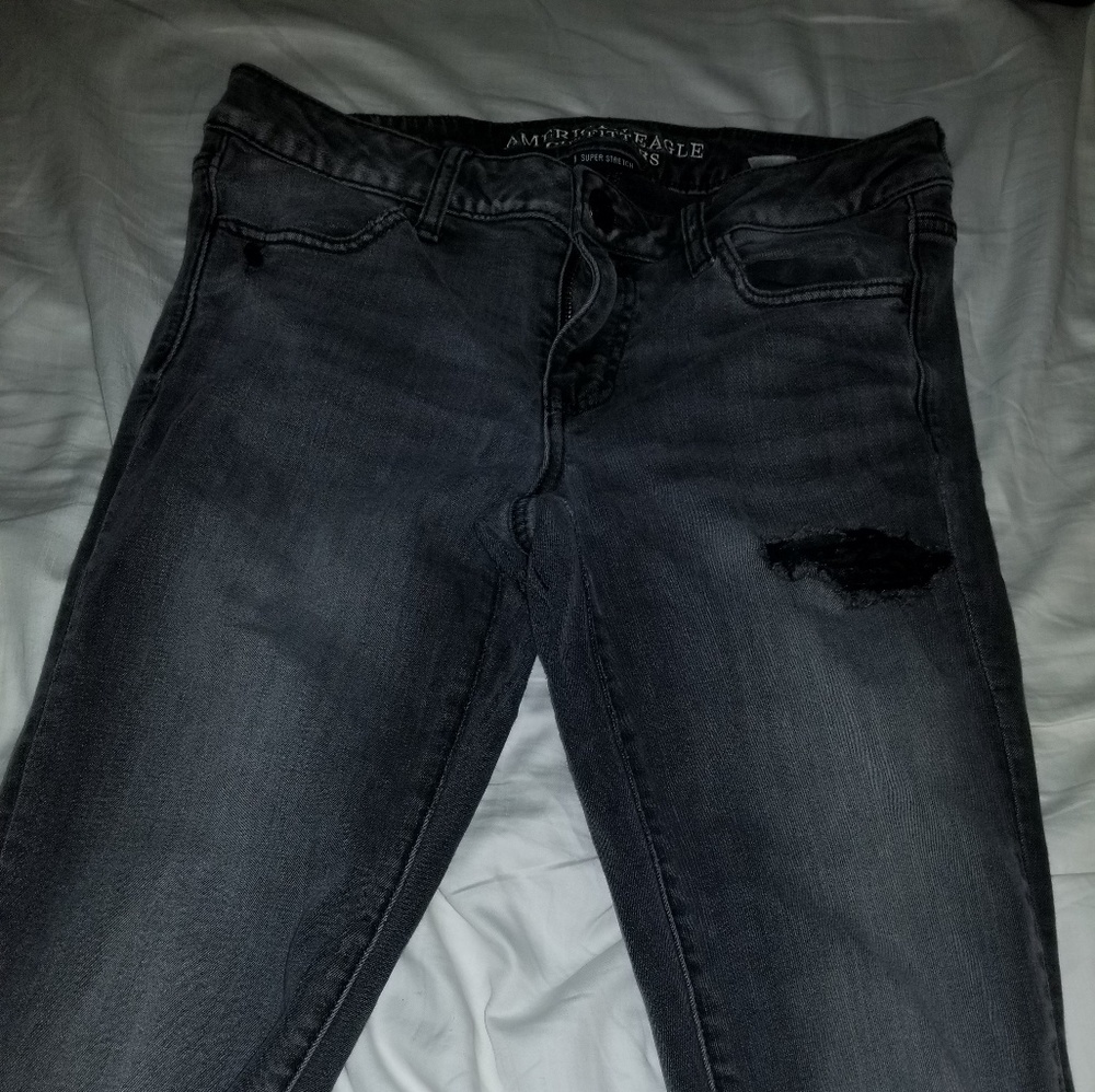 black ripped american eagle jeans